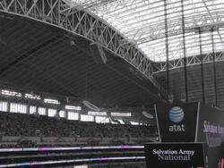  PAN Dome, video screen, and upper level stands packed with fans at Cowboys Stadium / Arlington, Texas, United States Stock Footage