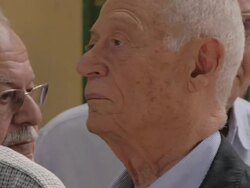 Voters queue at polling station News Clip
