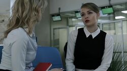 Two female office workers communicating friendly Stock Footage