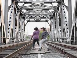 MS Young male and female couple dancing outside in urban area together having fun and smiling / Minneapolis, Minnesota, United States Stock Footage