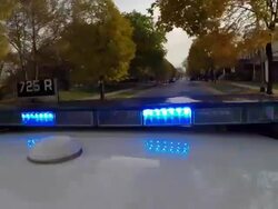 Chicago police car responding to an emergency News Clip