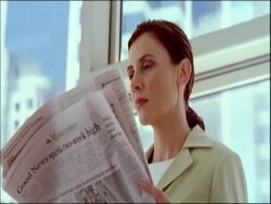 CU business woman waiting at monorail station reading paper, Sydney, Australia Stock Footage