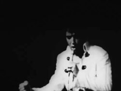 Elvis Presley sings before a live audience in Las Vegas Stock Footage