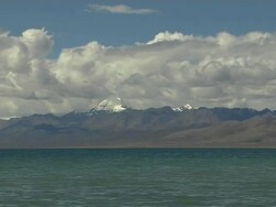 Pull Back Shot Mansarovar Lake and Mount Kailash Lhasa Tibet China Stock Footage