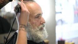 brutal barber clipper mows bearded adult senior hipster Stock Footage