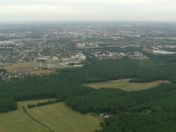 WS AERIAL View over buildings, houses and forest in Cottbus / Germany Stock Footage