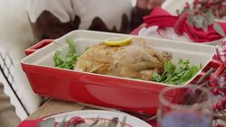 Christmas turkey in casserole dish on dinner table Stock Footage