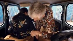 Image Sequence. OUTSIDER IN.Couple Dress Up In Small Car. Stock Footage