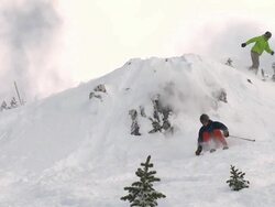 TS skier drops cliff into powder / golden, british columbia, canada Stock Footage