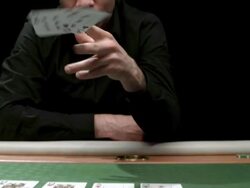 HD: Man Throwing Poker Cards At Camera Stock Footage