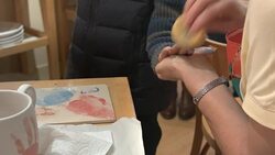 HD: Hand Prints on a Cup Arts and Craft Stock Footage