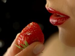 HD Super Slow-Mo: Wet Woman's Lips And Strawberry Stock Footage
