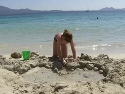 MS Girl playing at beach in holiday / Puerto Pollenca, Mallorca, Balearic Islands, Spain Stock Footage