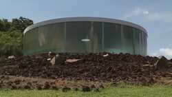 A forest and rugged landscaping surrounds the Sonic Pavilion in Belo Horizonte, Brazil. Stock Footage