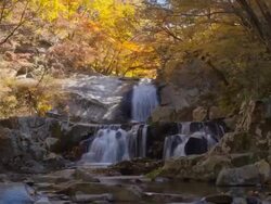 WS T/L POV View of people roaming around two layer waterfall in Bangtaesan mountain / Inje, Gangwon do, South Korea Stock Footage