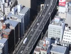 High elevation view of Tokyo city showing modes of transport using  Japan, Asia, Time Lapse Stock Footage