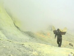 MS Miners working on the sulfur extraction at Ijen volcano crater / Ijen, Java, Indonesia Stock Footage