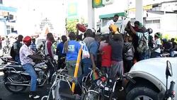 CLEAN : Lines at Haiti gas station after deadly fuel price violence News Clip