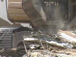 CU Bulldozer moving debris / Saarburg, Rhineland-Palatinate, Germany Stock Footage