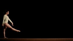 LD Female gymnast performing on balance beam Stock Footage