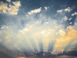 Sunlight through clouds at sunset. Stock Footage