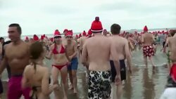 Thousands take the plunge in cold North Sea on New Year's Day News Clip