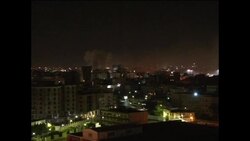 4:3 Night shots of airstrikes, Tripoli skyline, plume of smoke, upsound explosions News Clip