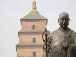 LS Statue of Master Xuan Zang and  Big Wild Goose Pagoda/xian,shaanxi,China Stock Footage
