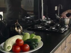 Woman adds salt into bowl with chicken wings Stock Footage