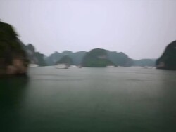 WS T/L POV View of Heads towards density of tree covered limestone islands, many other tourist boats in interconnecting channels / Ha Long Bay, Vietnam Stock Footage