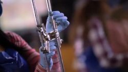 Students conduct chemistry lab experiments Stock Footage