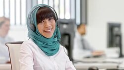 DS Portrait of a female Muslim call center operator Stock Footage