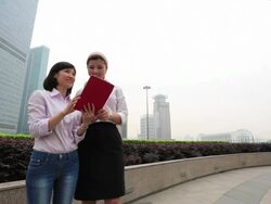 Young business man and woman talking at a open cafÃƒÂ© Stock Footage