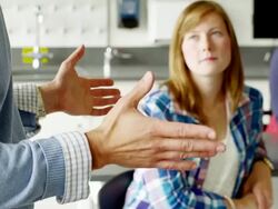 Teacher working with students in classroom Stock Footage
