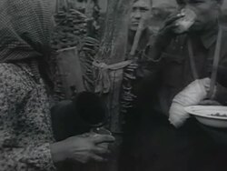 MS Peasant woman offering food supplies to injured Russian soldiers, wounded soldier drinking milk AUDIO / Russia Stock Footage