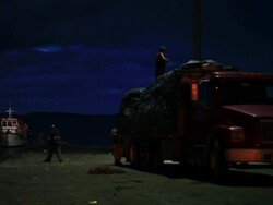 MS People working at small dock at night / Isla Quinchao, Isla Grande de ChiloÃŒÂ©, Chile Stock Footage