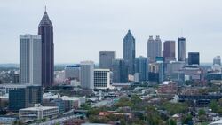 Elevated view over Interstate 85 passing the Downtown Atlanta skyline, Georgia, United States of America Stock Footage