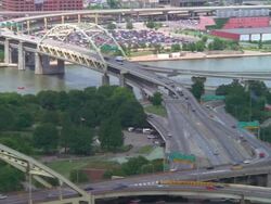 WS PAN View of freeway up to stadium near river / Pennsylvania, United States Stock Footage