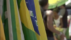 Flags of Brazil hang in a Manaus marketplace. Stock Footage