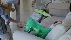 Family in living room with moving boxes Stock Footage