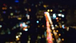 Bokeh of Bangkok cityscape at night Stock Footage