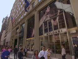  WS View of People walking amidst shops on 5th Avenue / New York City, New York, USA Stock Footage