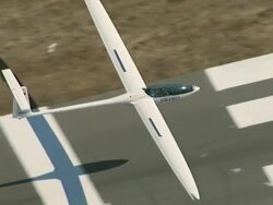 2010 AERIAL Glider flying over suburbs and landing on airfield runway / Santiago de Chile, Gran Santiago, Chile Stock Footage