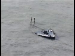 WRAP Work continues to minimise damage from oil spill, aerials News Clip