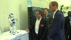 Prince William Watches Falling Robot News Clip
