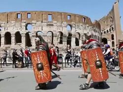 MS PAN Shot of Costumes parade for the anniversary of the birth of Rome, also knowns as "Natale di Roma" People dressed as ancient romans and gladiators walks along the landmarks of the city / Rome, Italy  Stock Footage