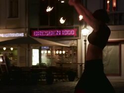 MS PAN Female fire dancer dancing instreet at night / Dresden, Saxony, Germany Stock Footage