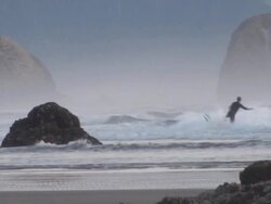 Surfer on Pacific Coast Stock Footage