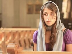 Young woman praying Stock Footage
