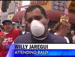 Demonstrators converged from several May Day immigrants rights rallies in Los Angeles. The AP's John Mone reports some wore masks because they worry about getting sick or they think swine flu has become an anti-immigrant issue. Instructional Video